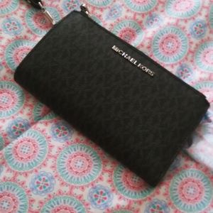 Michael kohrs smartphone wristlet